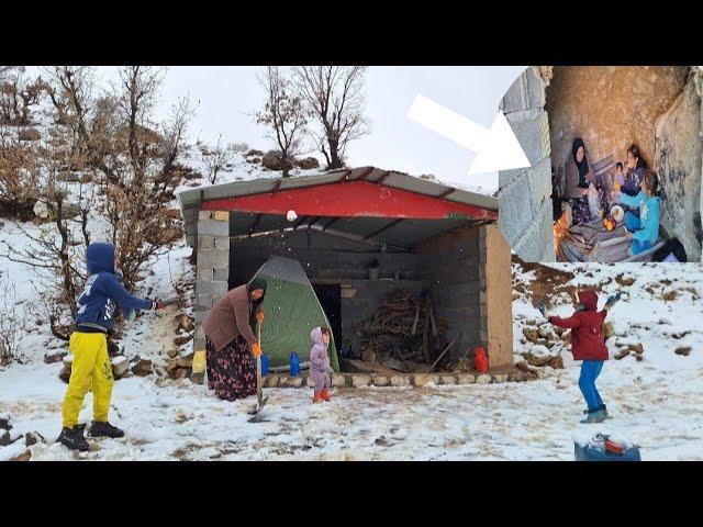 secret shelter in mountains:Taking shelter of mother and three children to the cave in snow blizzard