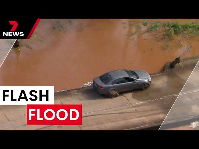 Flash flooding in north-west Queensland disrupting new year plans | 7NEWS