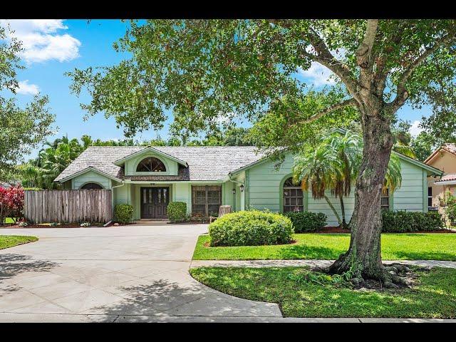 Shores of Jupiter FOR SALE 18912 Still Lake Dr, Jupiter, FL. Well maintained pool home on preserve.