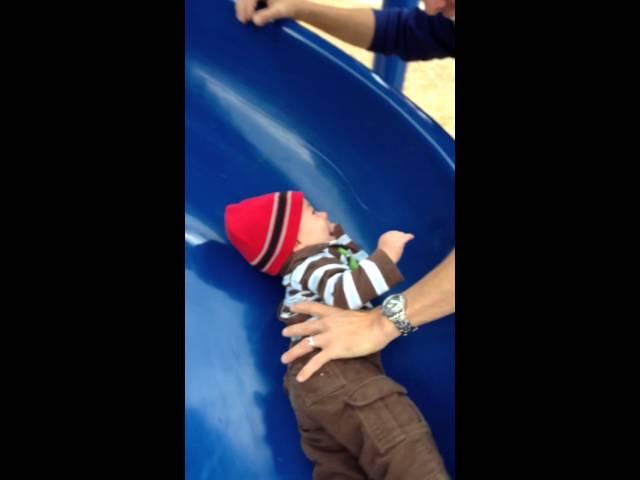 Preston goes down the slide