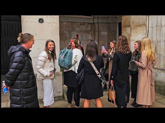 RUDE GROUP OF AUSSIE LADIES TELL JOKES TO TRY AND MAKE THE GUARD LAUGH at Horse Guards!