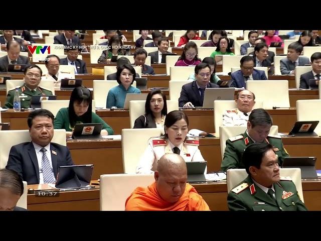 Chủ tịch Ủy ban Trung ương Mặt trận Tổ quốc Việt Nam Đỗ Văn Chiến trình bày báo cáo tại Quốc hội