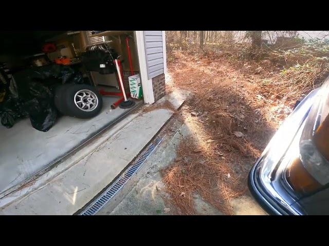 Old front garage door drainage