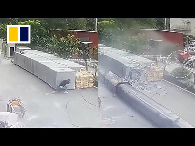 Narrow escape as falling crane in China almost crushes man