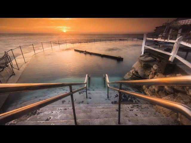 Start your day by watching beautiful Bronte Beach change colours as the sun slowly rises over Sydney