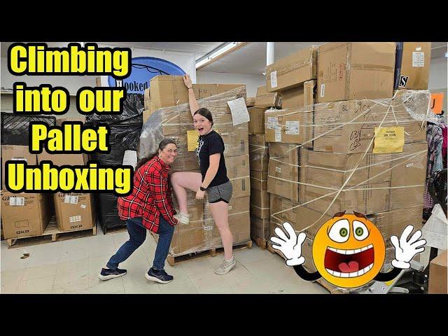 Climbing into our Pallet unboxing and Finding some Crazy stuff!