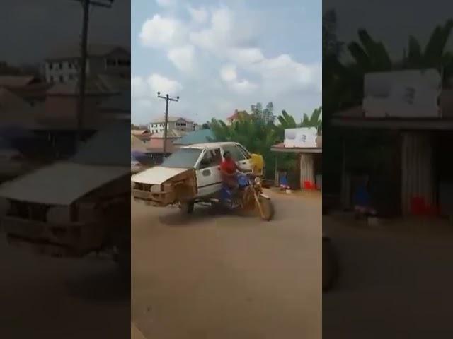 Okada seen carrying a car