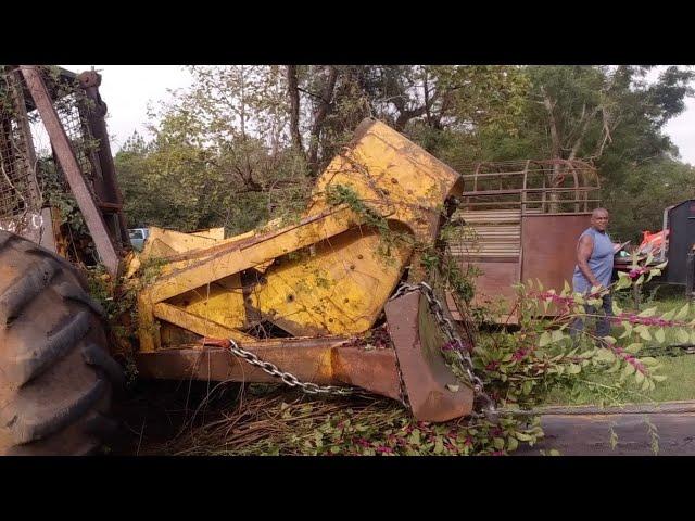 Owner Watches us load his Old Logging Skidder.