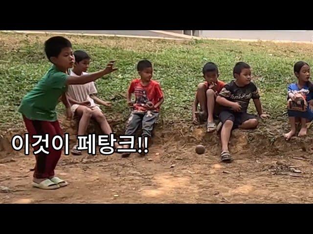 LA라오스 오지마을 훼이산(Huaysan) 갔더니 아이들이 구슬치기를 하고 있네요. 그런데 구슬이...