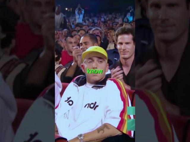 Eminem (the one real troublemaker) accepts award from Christina Aguilera