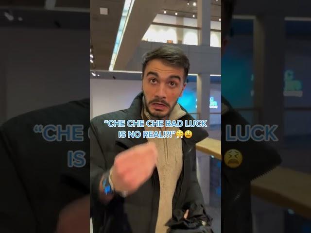 Opening  an umbrella inside in front of my Italian husband 