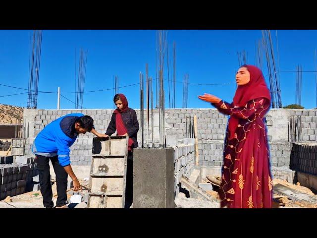 **"The Sound of Construction: The Nomadic Life of the Ghasem Family in the Heart of the Village"**