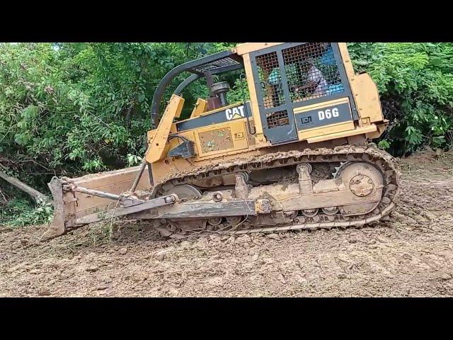 Caterpillar D6G Bulldozer Levels Hard Ground in Farm Road Construction Project