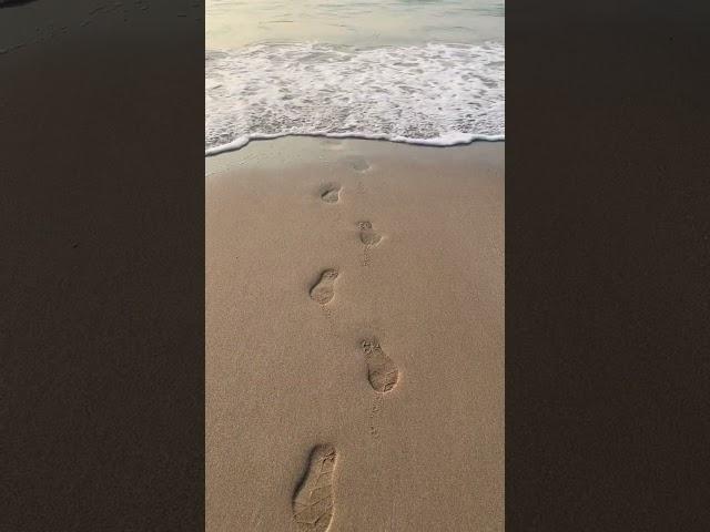 Sea waves  washed away sand foot prints  #seabeach #seawaves #beachcamping #footprints