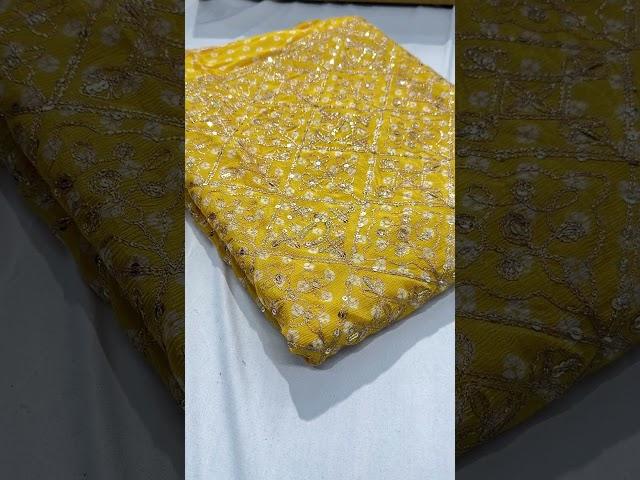 this stunning Chinon fabric with Bandhani print,beautifully embroidered with golden zari and sequins