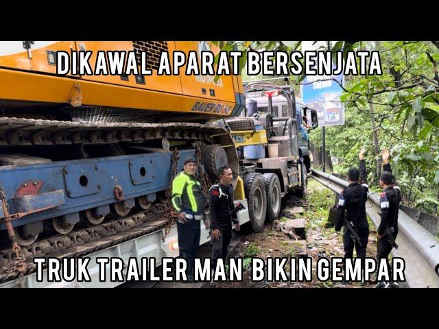 Dikawal Aparat Bersenjata, Truk Trailer MAN Muatan Super Panjang Bikin Gempar Sitinjau Lauik