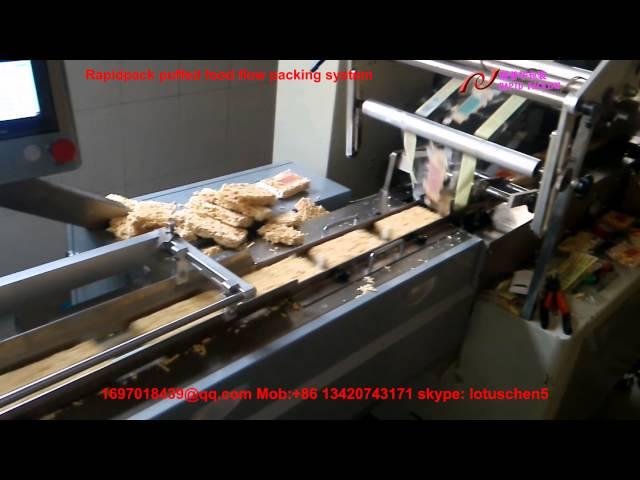 Rapidpack puffed food rice bar flow packing system膨化分切理料