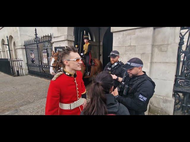 Police confront man dressed as a kings guard making a rap video #thekingsguard