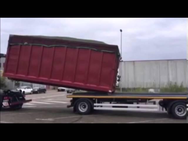 Погрузка контейнера с помощью Multilift-системы на прицеп-платформу