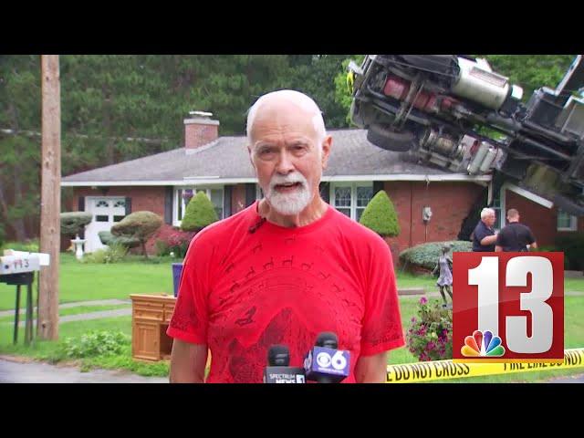 Man discusses huge crane that crashed into his North Greenbush home