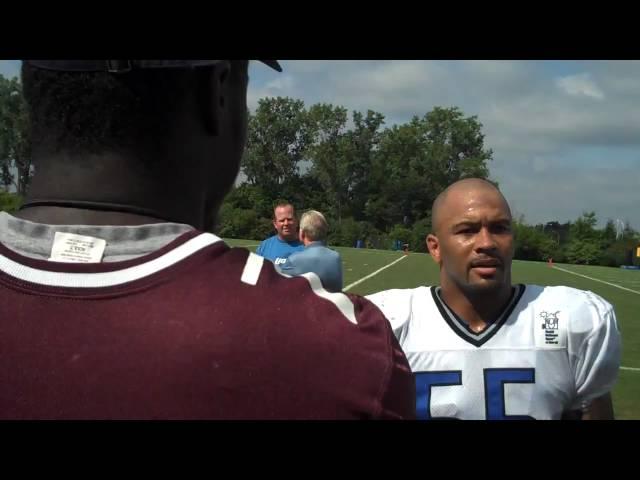 Larry Foote rehases the old days with former coach Greg Carter