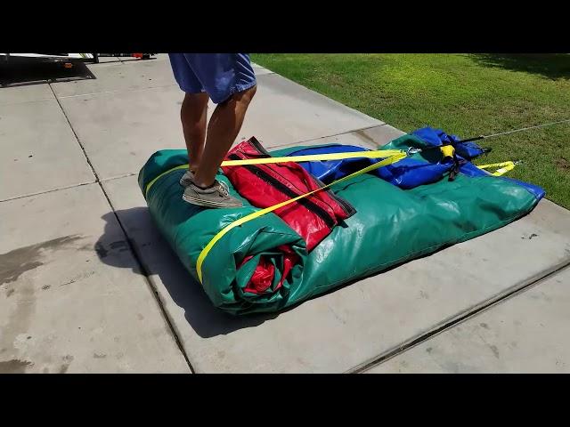 How To Easily Roll Up A Water Slide Inflatable With Dolly Winch - Bounce House