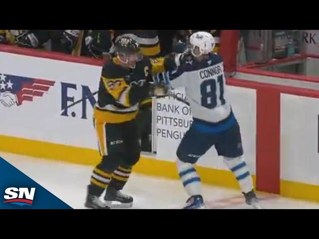 Penguins' Crosby and Jets' Connor Exchange Punches in Unlikely Tilt