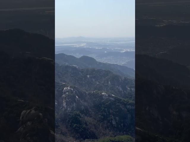 Panoramic view of the city from Munsubong and Nahanbong, the last peaks of Uisang Ridge