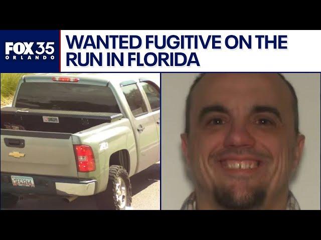 Florida deputies search for wanted fugitive after he flees, abandons car on beach