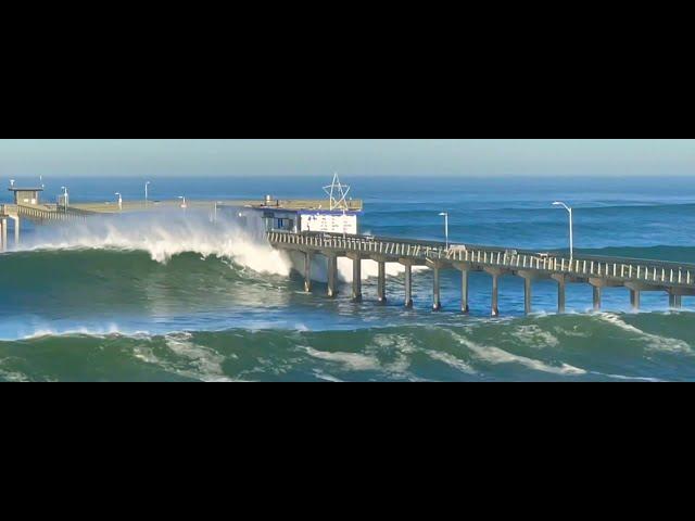 Waves Destroy OB Pier and take down surfer