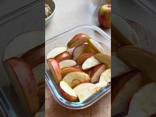 Breakfast recipe: quick oats, baked apples, and raspberry sauce.