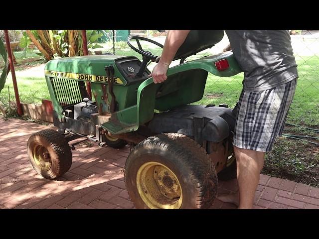 Repairing and painting the John Deere317's panels.