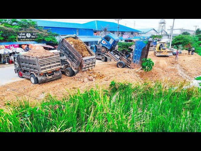 Nicely SHOW LANDFILL by Expert operator skill Dozer KOMATSU D31PX pushing soil into water clear land