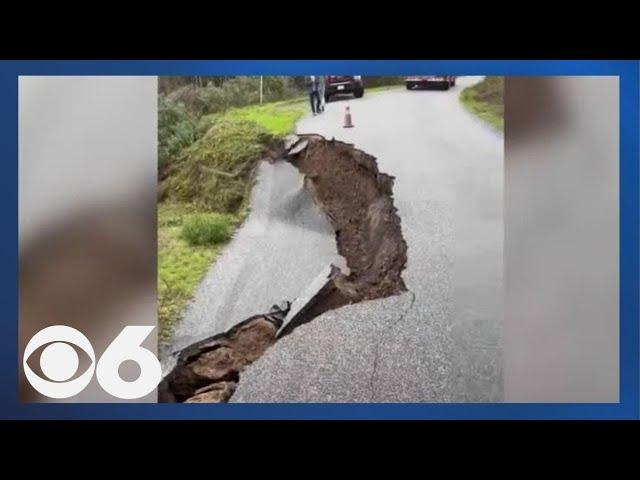 Video shows road collapsing after record rains in Pescadero, California