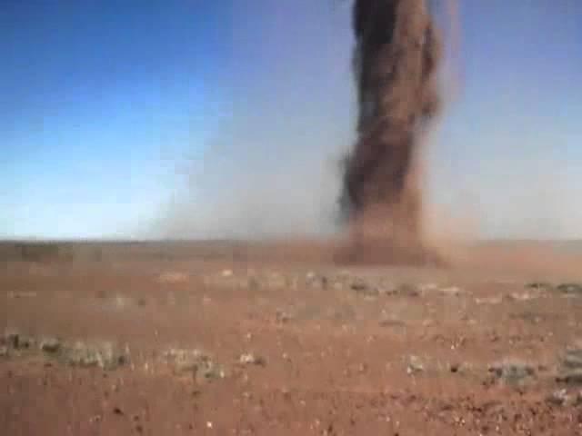 Crazy Guy Runs Into Outback Tornado To Take Selfie!