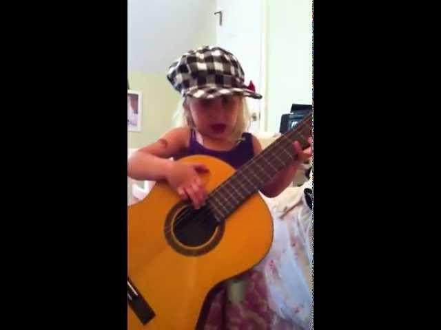 ZoeRider singing baby with guitar