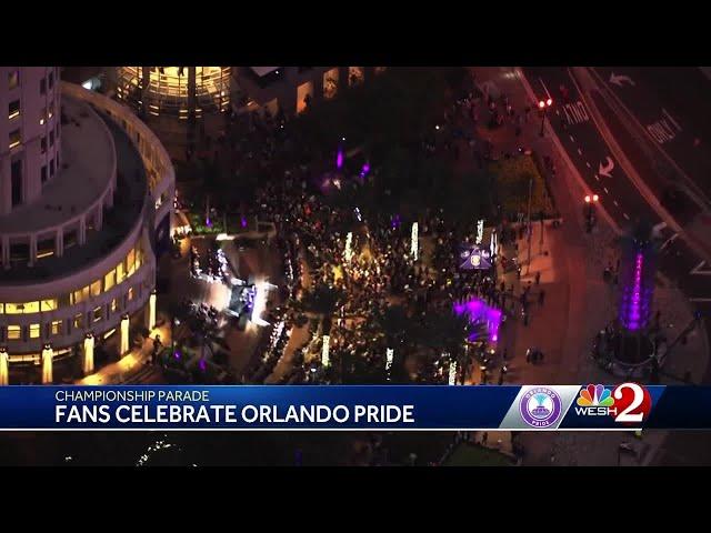 Fans celebrate soccer team Orlando Pride's historic championship with downtown parade