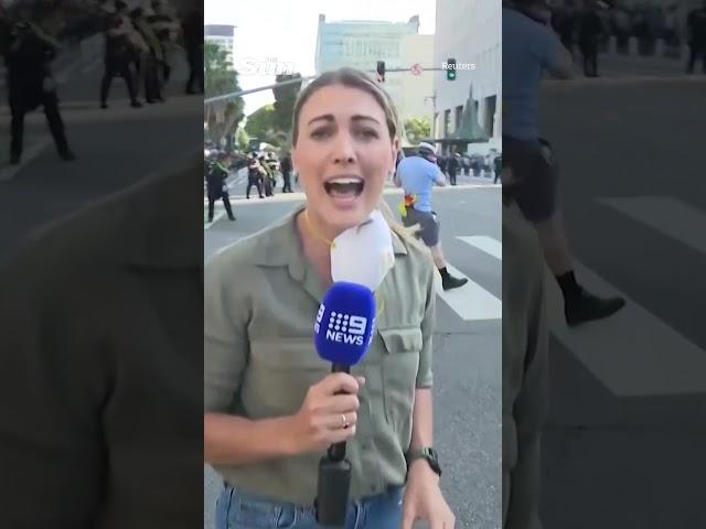 Moment LA cops shoot TV reporter with rubber bullet as photographer injured #losangeles #protest