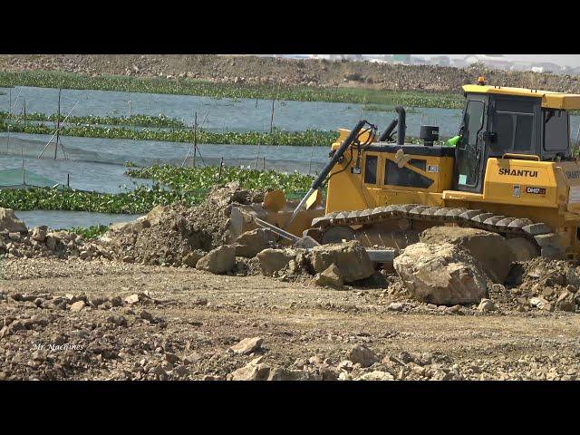 Good Heavy Bulldozer Pushing Gravel Rock with Dump Truck Unloading Working in Action Building Road