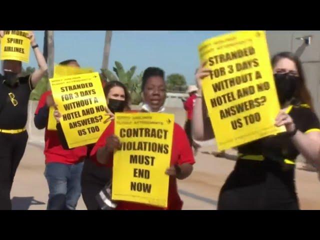 Employees with Spirit Airlines protest at Orlando International Airport