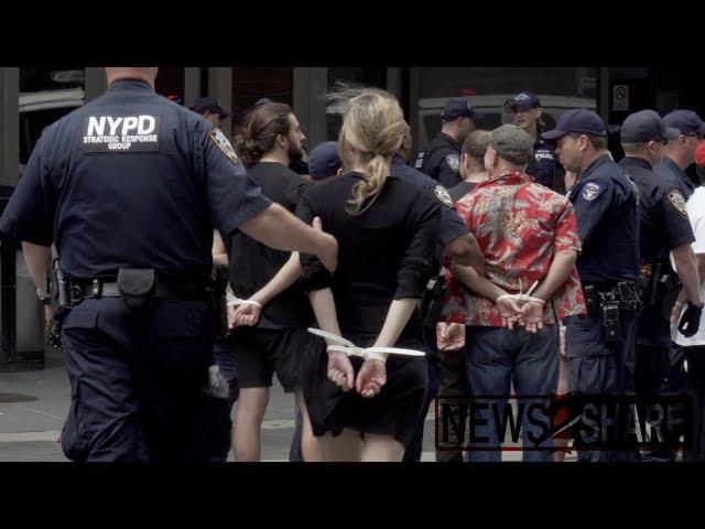 70 "Extinction Rebellion NYC" activists arrested blocking street outside NYT Building