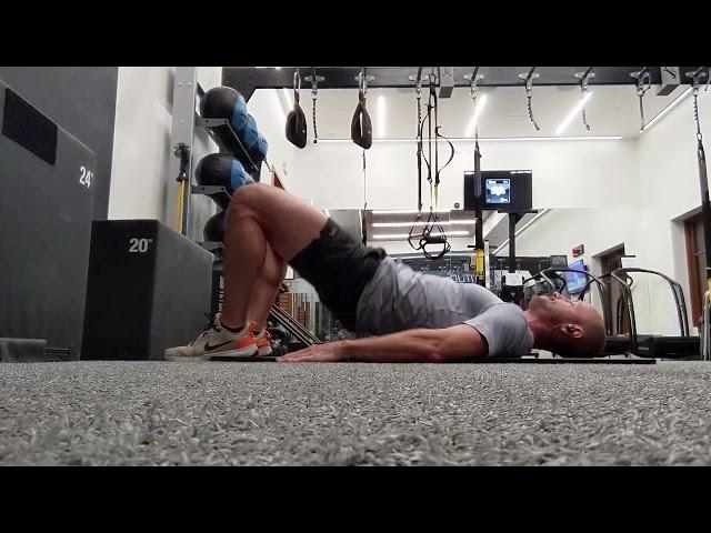 Glute Bridge with Tail Tucked (posterior pelvic tilt)