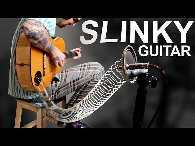 I Made A SLINKY TOY GUITAR And It Sounds Like Space Lasers In Huge Caves