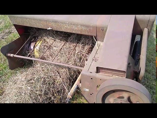 Compact TYM 35 HP tractor baling hay