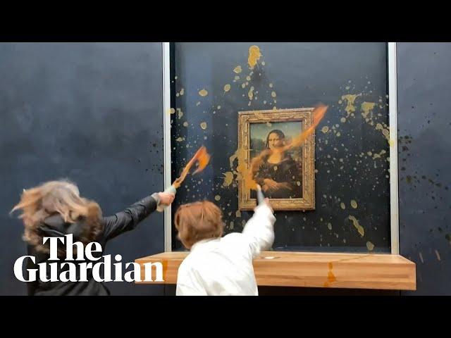 Moment protesters throw soup at Mona Lisa painting in Paris