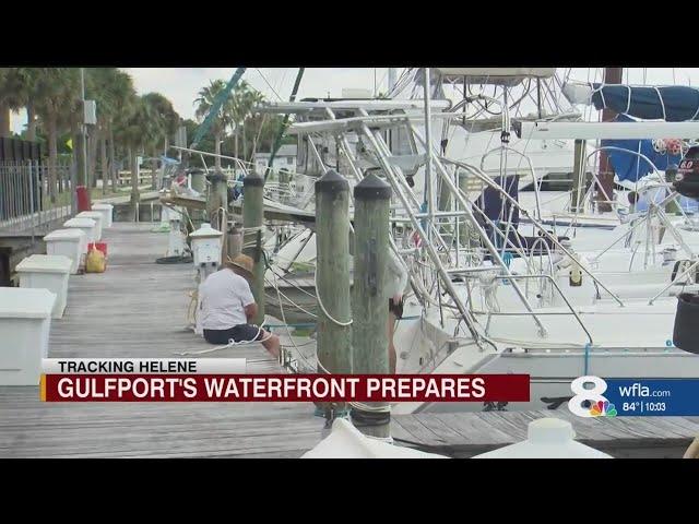 Gulfport residents board up homes and tie down boats ahead of storm