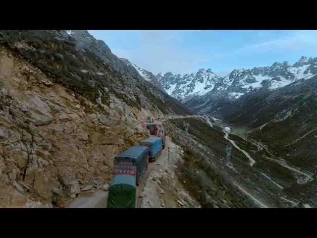 The challenge of driving along the steep cliffs on the Sichuan-Tibet Highway