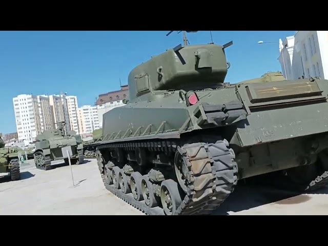 walk a military museum Russian tanks and planes inside