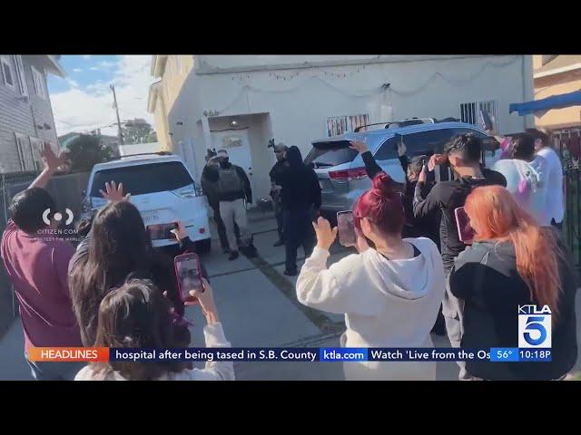 ICE raids at least 3 homes, arrests mother in South L.A.