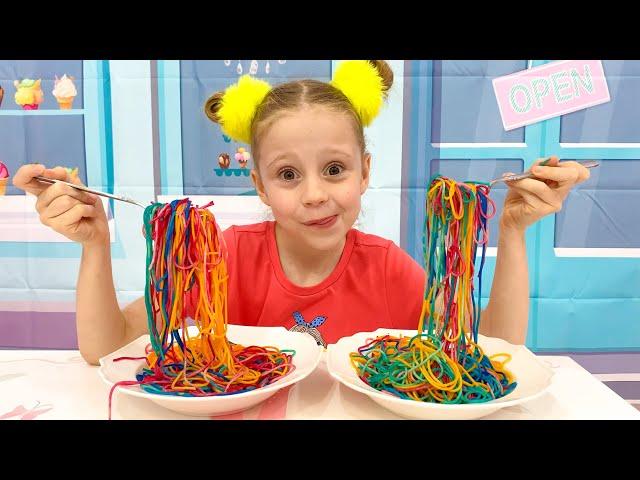 Nastya and Papa are preparing colored noodles